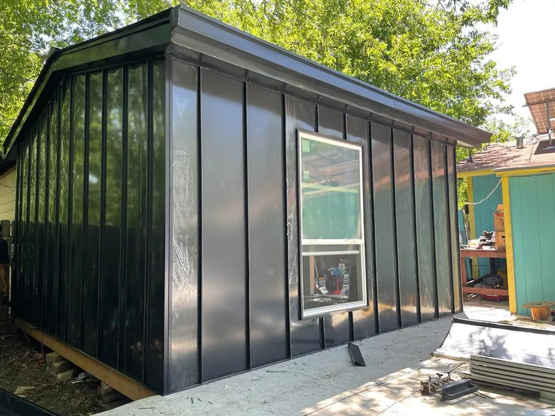 Black standing seam metal wall panels for Metal Roof Installation in Merriam