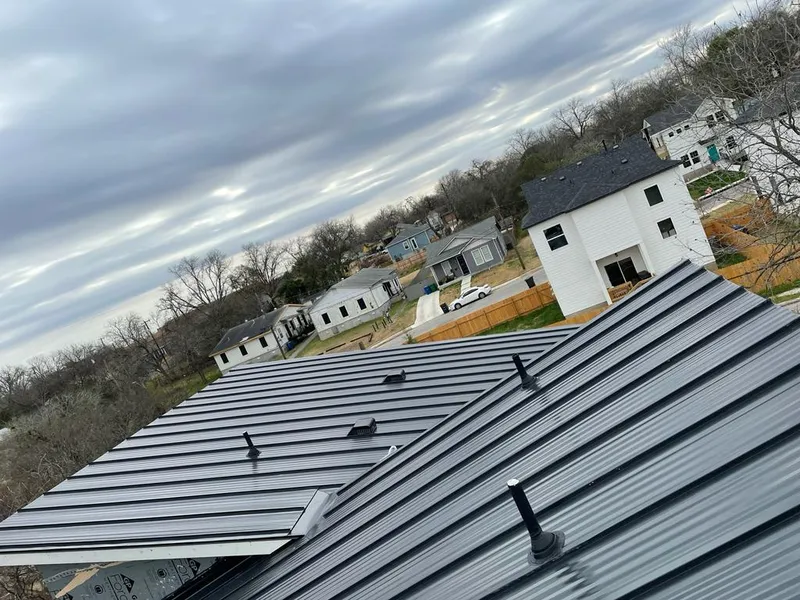 Standing seam metal roof panels with vents for Skylight Repair in Merriam
